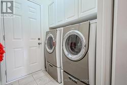 Mainfloor Laundry with Garage Access - 