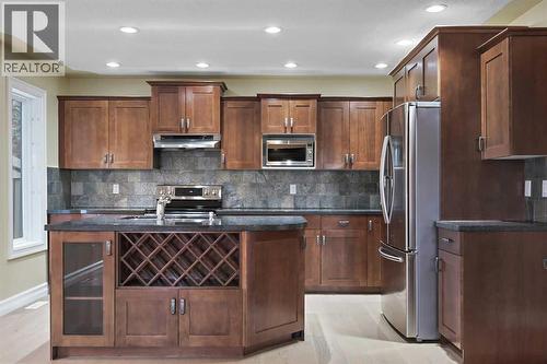 5619 Coach Hill Road Sw, Calgary, AB - Indoor Photo Showing Kitchen With Stainless Steel Kitchen