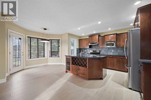 5619 Coach Hill Road Sw, Calgary, AB - Indoor Photo Showing Kitchen With Stainless Steel Kitchen