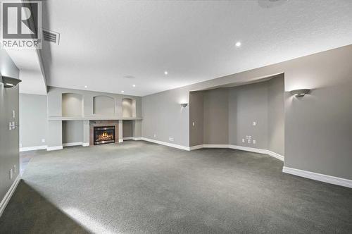 5619 Coach Hill Road Sw, Calgary, AB - Indoor With Fireplace