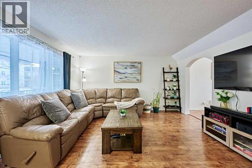 2366 Eversyde Avenue Sw, Calgary, AB - Indoor Photo Showing Living Room