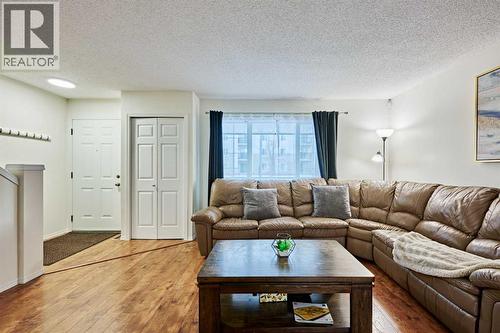 2366 Eversyde Avenue Sw, Calgary, AB - Indoor Photo Showing Living Room