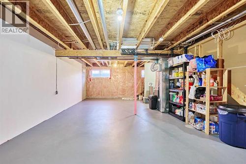 2366 Eversyde Avenue Sw, Calgary, AB - Indoor Photo Showing Basement