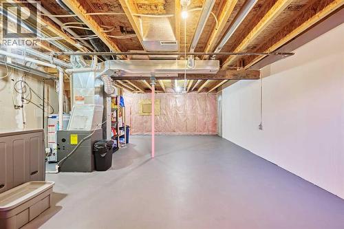 2366 Eversyde Avenue Sw, Calgary, AB - Indoor Photo Showing Basement
