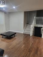 The dining area features hardwood floors and sleek pot lights, creating a warm yet modern atmosphere. Open to the kitchen, the space feels connected and inviting—perfect for both everyday meals and en - 