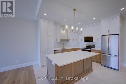 93 Bedell Drive, Mapleton, ON - Indoor Photo Showing Kitchen With Stainless Steel Kitchen