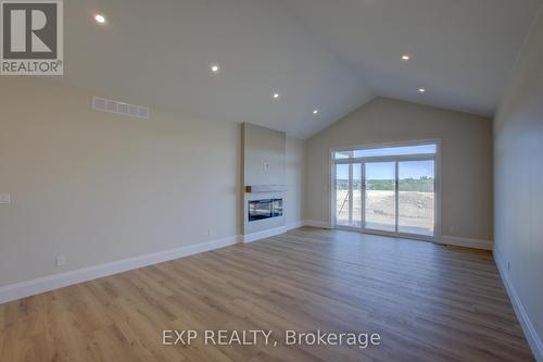 93 Bedell Drive, Mapleton, ON - Indoor With Fireplace