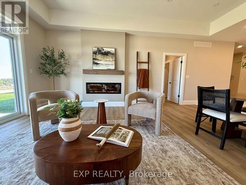 93 Bedell Drive, Mapleton, ON - Indoor With Fireplace