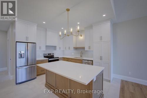 93 Bedell Drive, Mapleton, ON - Indoor Photo Showing Kitchen With Stainless Steel Kitchen