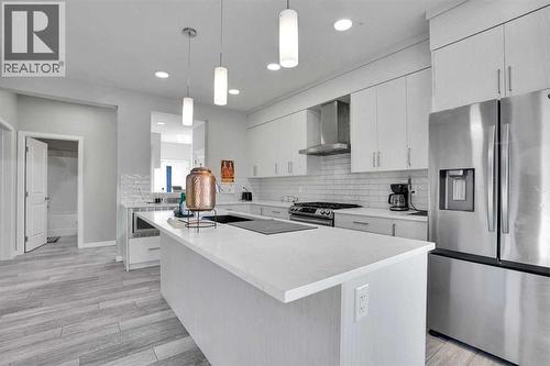 210 Lucas Close Nw, Calgary, AB - Indoor Photo Showing Kitchen With Stainless Steel Kitchen With Upgraded Kitchen