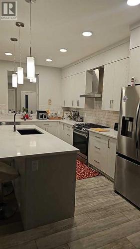 210 Lucas Close Nw, Calgary, AB - Indoor Photo Showing Kitchen With Stainless Steel Kitchen With Upgraded Kitchen