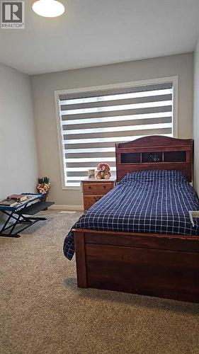 210 Lucas Close Nw, Calgary, AB - Indoor Photo Showing Bedroom