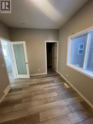 210 Lucas Close Nw, Calgary, AB - Indoor Photo Showing Other Room