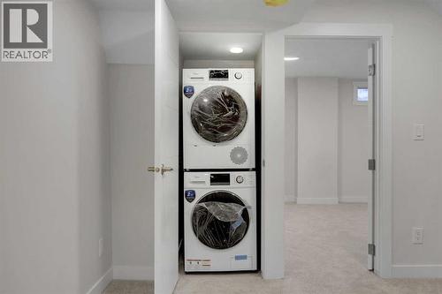 13 Penworth Close Se, Calgary, AB - Indoor Photo Showing Laundry Room