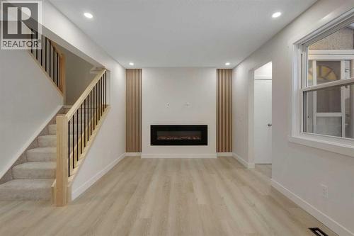 13 Penworth Close Se, Calgary, AB - Indoor With Fireplace