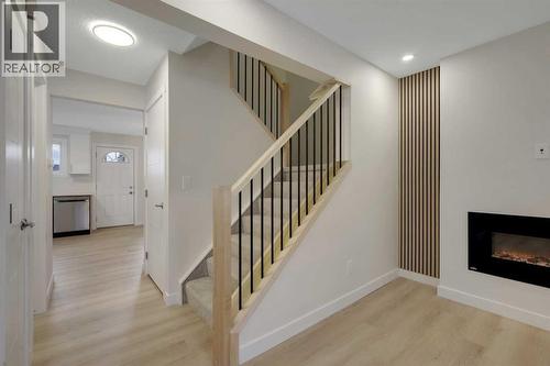 13 Penworth Close Se, Calgary, AB - Indoor With Fireplace