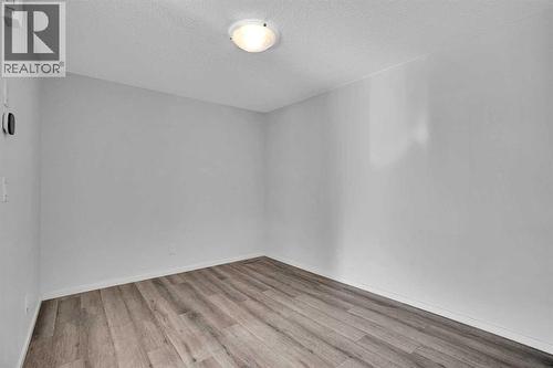 Living Room - 408 Windbury Link Sw, Airdrie, AB - Indoor Photo Showing Other Room