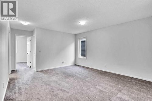 Bonus room - 408 Windbury Link Sw, Airdrie, AB - Indoor Photo Showing Other Room