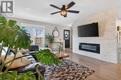 317 Legacy Boulevard Se, Calgary, AB - Indoor Photo Showing Living Room With Fireplace