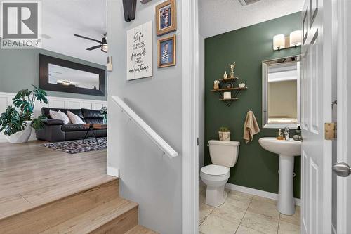 Main Floor Powder Room - 317 Legacy Boulevard Se, Calgary, AB - Indoor Photo Showing Bathroom