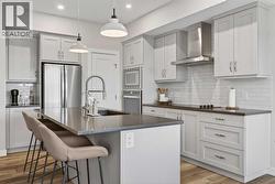 Stainless steel appliances with built-in cook top, range and microwave with large pantry - 