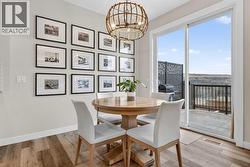 Dining room with direct access to the private back deck and yard - 