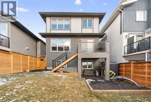 Large backyard with privacy and upper deck access - 307 Precedence Hill, Cochrane, AB - Outdoor With Exterior