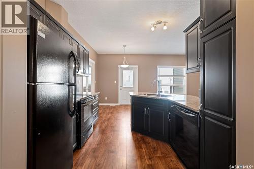 507 3830 Dewdney Avenue E, Regina, SK - Indoor Photo Showing Kitchen With Double Sink