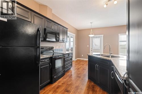 507 3830 Dewdney Avenue E, Regina, SK - Indoor Photo Showing Kitchen With Double Sink