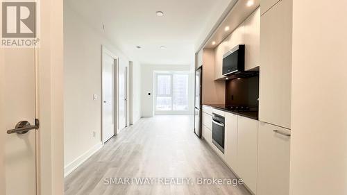 606 - 25 Cordova Avenue, Toronto, ON - Indoor Photo Showing Kitchen
