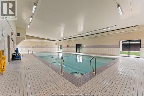 9099 Riverside Drive East Unit# E1017, Windsor, ON - Indoor Photo Showing Other Room With In Ground Pool