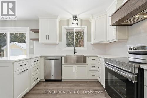 109 Mcgivern Street, Mapleton, ON - Indoor Photo Showing Kitchen With Double Sink