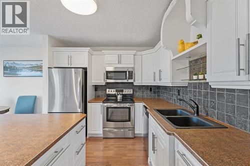 kitchen - 164 Beddington Circle Ne, Calgary, AB - Indoor Photo Showing Kitchen With Stainless Steel Kitchen With Double Sink