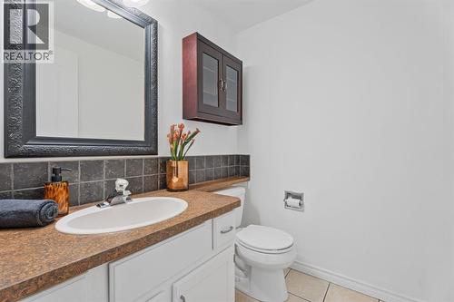 powder room on main - 164 Beddington Circle Ne, Calgary, AB - Indoor Photo Showing Bathroom