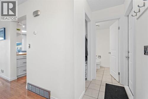 entrance to closet and powder room on main - 164 Beddington Circle Ne, Calgary, AB - Indoor Photo Showing Other Room