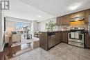 209 - 45 Kingsbury Square, Guelph (Pineridge/Westminster Woods), ON  - Indoor Photo Showing Kitchen With Stainless Steel Kitchen 