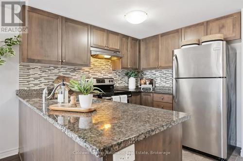 209 - 45 Kingsbury Square, Guelph (Pineridge/Westminster Woods), ON - Indoor Photo Showing Kitchen With Stainless Steel Kitchen With Upgraded Kitchen