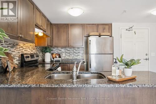209 - 45 Kingsbury Square, Guelph (Pineridge/Westminster Woods), ON - Indoor Photo Showing Kitchen With Stainless Steel Kitchen With Double Sink With Upgraded Kitchen