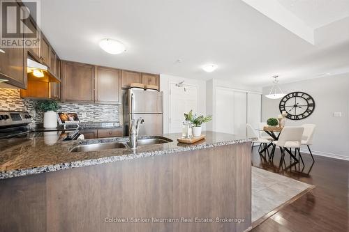 209 - 45 Kingsbury Square, Guelph (Pineridge/Westminster Woods), ON - Indoor Photo Showing Kitchen With Double Sink