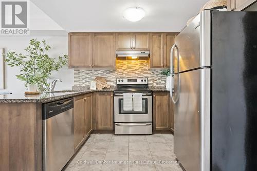 209 - 45 Kingsbury Square, Guelph (Pineridge/Westminster Woods), ON - Indoor Photo Showing Kitchen With Stainless Steel Kitchen With Upgraded Kitchen