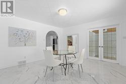 Access the screened in porch through those doors - 