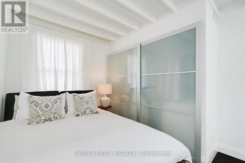 448 Gerrard St E Primary Double Closet - 448 Gerrard Street E, Toronto, ON - Indoor Photo Showing Bedroom