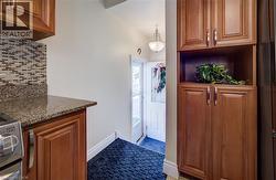 Foyer entrance featuring baseboards - 