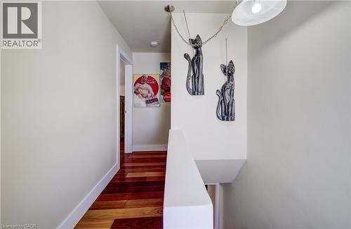 Hall with dark wood finished floors and baseboards - 1170 Union Street, Kitchener, ON - Indoor Photo Showing Other Room