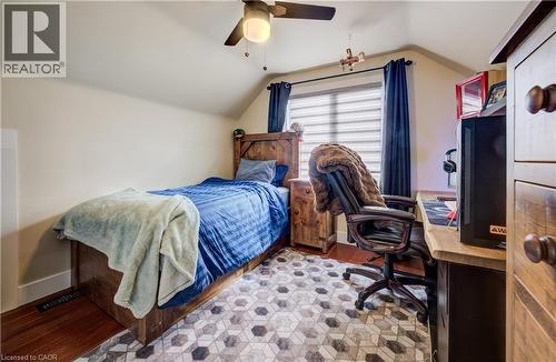 Bedroom with vaulted ceiling, a ceiling fan, and light wood finished floors - 1170 Union Street, Kitchener, ON - Indoor Photo Showing Bedroom