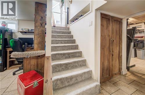 Staircase featuring tile patterned floors - 1170 Union Street, Kitchener, ON - Indoor Photo Showing Other Room