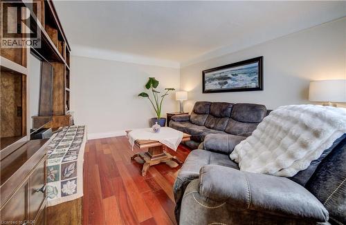 Living area with hardwood / wood-style floors and baseboards - 1170 Union Street, Kitchener, ON - Indoor Photo Showing Living Room