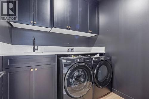 383 Caledonia Boulevard W, Lethbridge, AB - Indoor Photo Showing Laundry Room