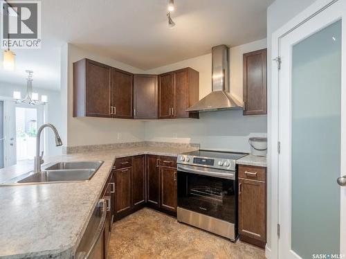 5102 Snowbirds Crescent, Regina, SK - Indoor Photo Showing Kitchen With Double Sink