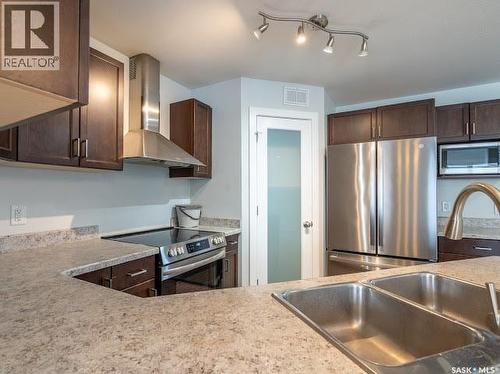 5102 Snowbirds Crescent, Regina, SK - Indoor Photo Showing Kitchen With Double Sink